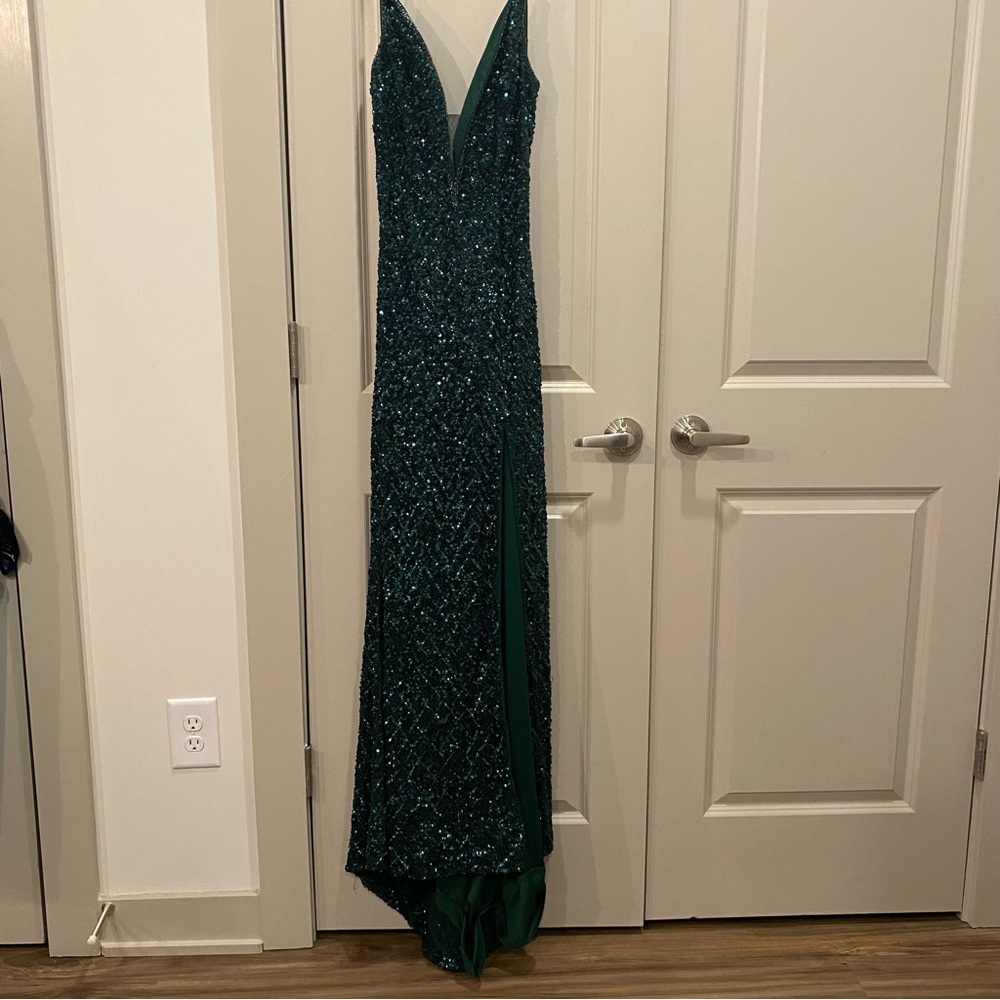 dark green beaded sparkly prom dress with thigh slit